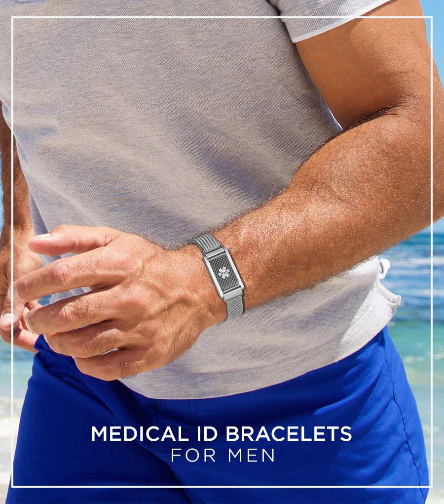 Man jogging on the beach wearing carbon fiber and silver medical ID alert bracelet