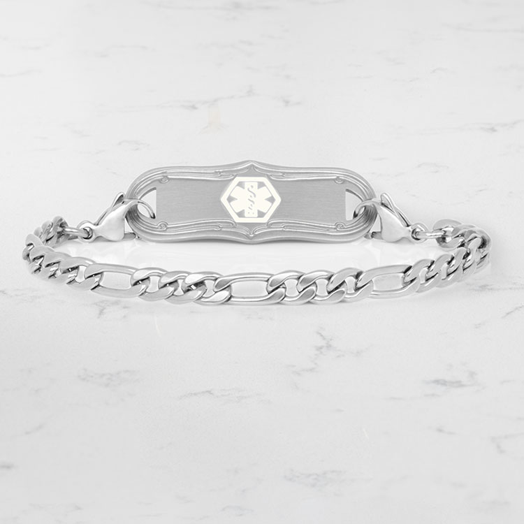 Classic stainless steel medical ID figaro chain bracelet with medical ID tag on marble background