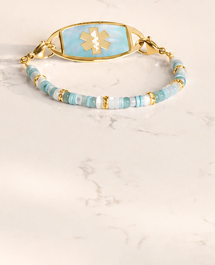 Blue heishi medical ID bracelet with gold and blue mother of pearl accents