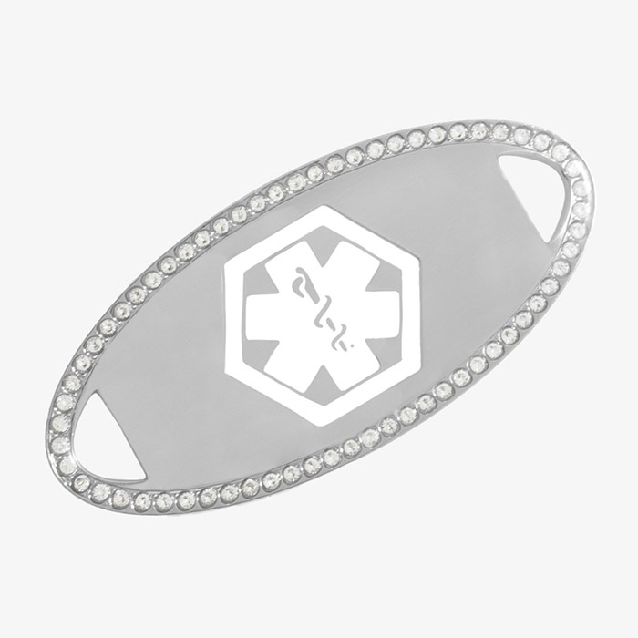 Silver-tone medical ID tag with a border of clear cubic zirconia crystals and an engraved white medical caduceus symbol in the center.
