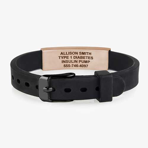 Black silicone band with black watch-style closure and rose gold tone stainless Medical ID tag with white caduceus. Engraving inside tag