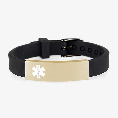 Adjustable black silicone band with black metal buckle closure holds a Gold tone stainless ID tag with white caduceus symbol.