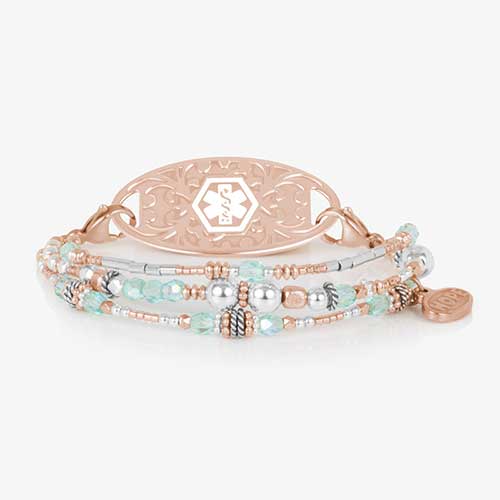 Mix and match bracelet with 3 strands of light blue and rose tone beads. Shown with a coordinating ID tag.