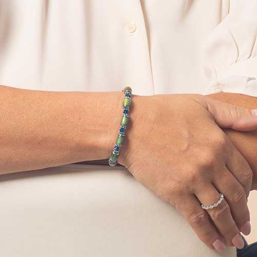 Color-changing mood beads with stainless steel and Blue Swarovski crystal accents interchangeable ID bracelet on wrist