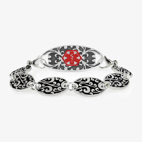 Decorative chain bracelet with circular patterned links and intricate medical alert tag