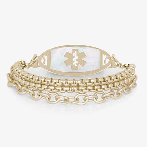Three strand gold tone chain medical ID bracelet with decorative gold tone stainless steel med ID tag with mother of pearl inlay and gold symbol