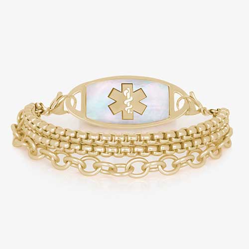 Three strand gold tone chain medical ID bracelet with decorative gold tone stainless steel med ID tag with mother of pearl inlay and gold symbol