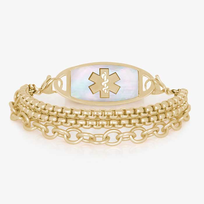 Three strand gold tone chain medical ID bracelet with decorative gold tone stainless steel med ID tag with mother of pearl inlay and gold symbol