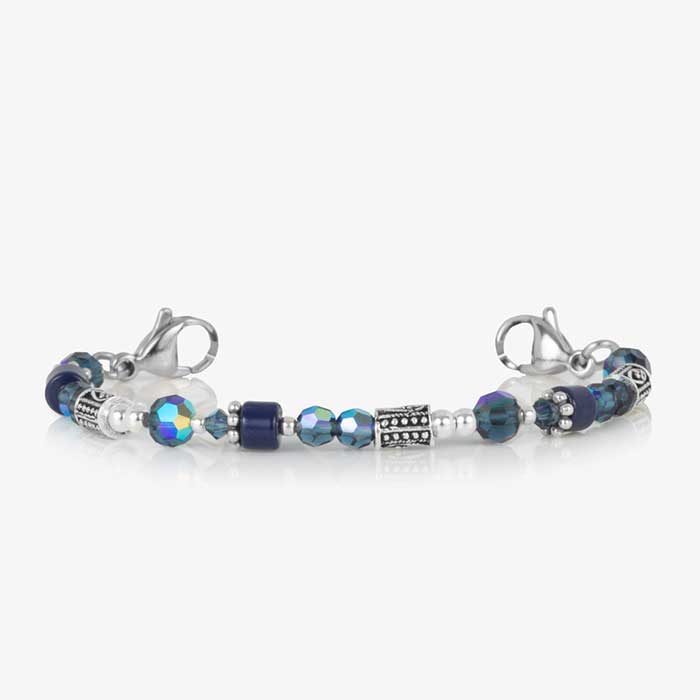 Blue and silver beaded medical ID bracelet on jewelry elastic with stainless steel lobster clasps and sapphire blue decorative med ID tag.