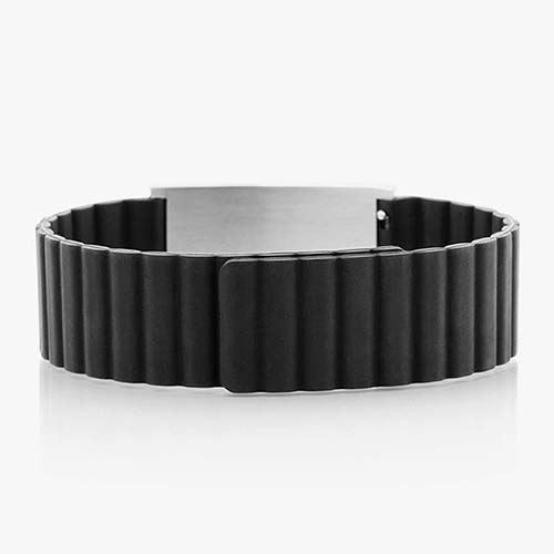 Low back angle of black silicone, magnetic band with a silver tag.