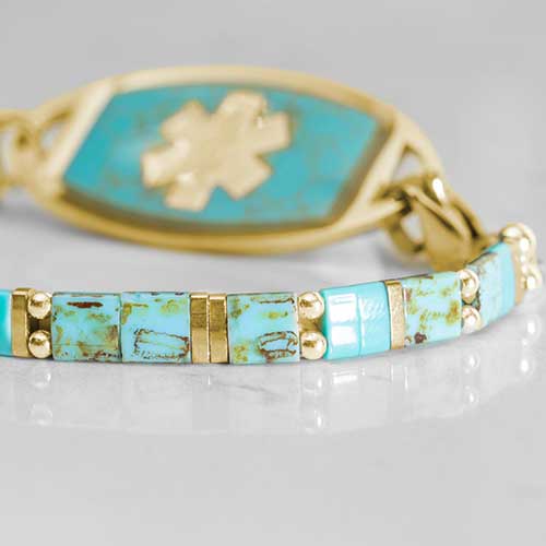 Close up image of turquoise tile beads.