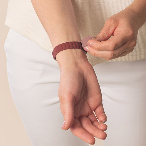 Hypoallergenic Urban MagSport medical alert bracelet in Merlot, shown on wrist with a Lauren’s Hope engraved ID tag, brushed silver finish, and gold-tone medical symbol