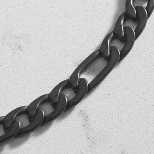 Close up of Sandblasted black, figaro style medical ID alert chain bracelet with decorative medical ID tag