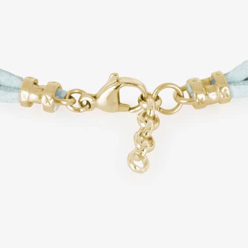 Light Blue Suede bands and adjustable gold tone clasp. Fastens on wrist with a lobster claw clasp.