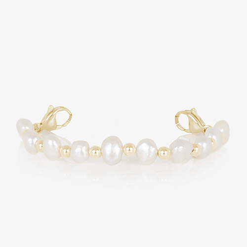 Gold medical ID bracelet with freshwater pearls and mother of pearl inlay tag on white background.