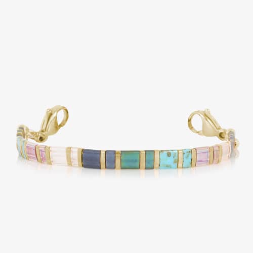 Gold-tone bracelet with rectangular beads in aqua, blue, pink, clear, and iridescent tones, shown without an ID tag.