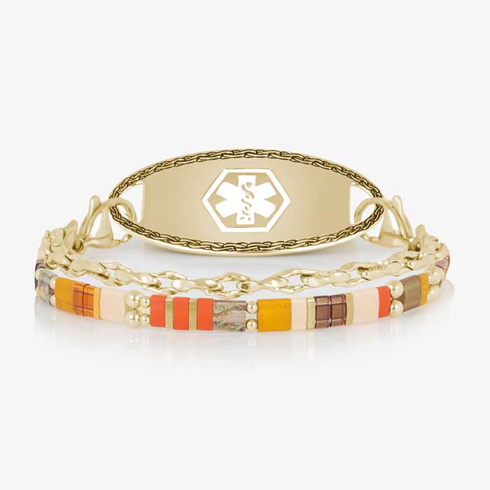 Close-up of the bracelet highlighting colorful rectangular beads in orange, cream, brown, green, and red with gold-tone accents.