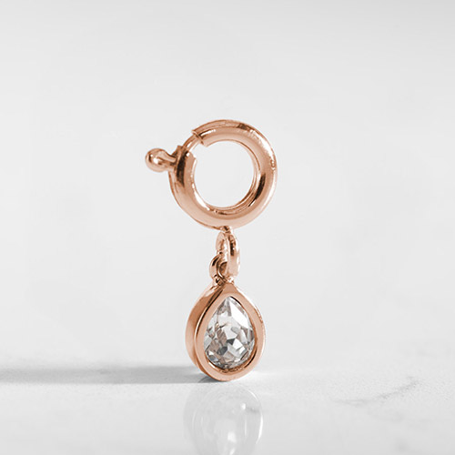 Elegant Kai Crystal Teardrop Charm in 14k rose gold plate, featuring a clear cubic zirconia, designed for Lauren’s Hope medical alert jewelry