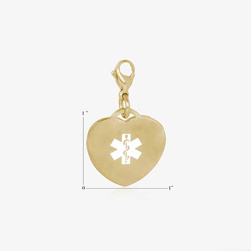 Heart-shaped, gold tone medical alert charm with white symbol on matching gold lobster clasp, showing charm measurements of one inch by one inch.