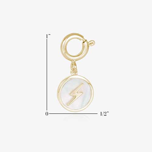 Round, gold tone charm, featuring a mother of pearl inlay with gold lightning bolt. Show measurements of one inch by one half inch.