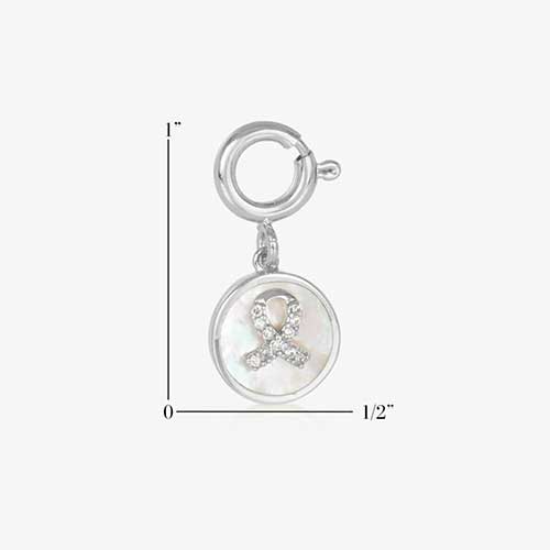 Silver tone round charm with mother of pearl inlay and gold awareness ribbon with inset crystals. Showing measurement of one inch by one half inch.