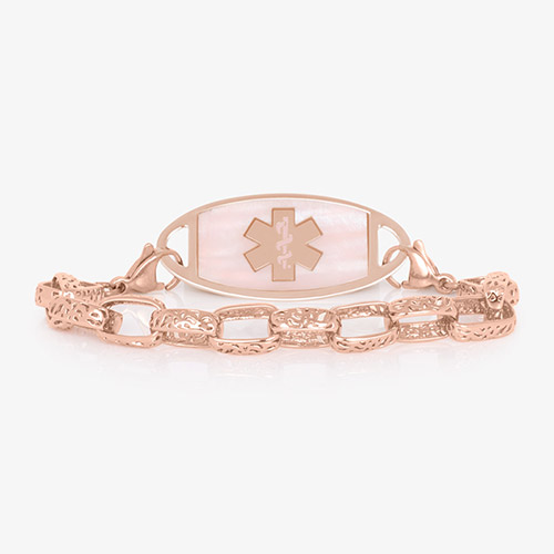 Rose gold plated detailed oval link chain paired with rose gold tone stainless steel medical ID tag with mother of pearl inlay and coordinating rose gold tone medical symbol.