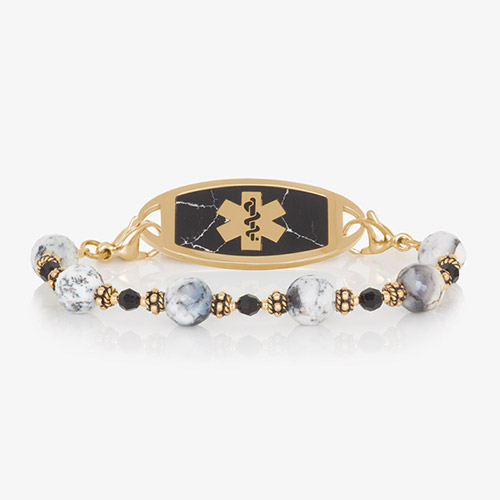 Dendritic opal, black crystal, and gold beaded medical ID bracelet paired with gold tone stainless steel medical ID tag with mother of pearl inlay and gold tone medical symbol at the center.