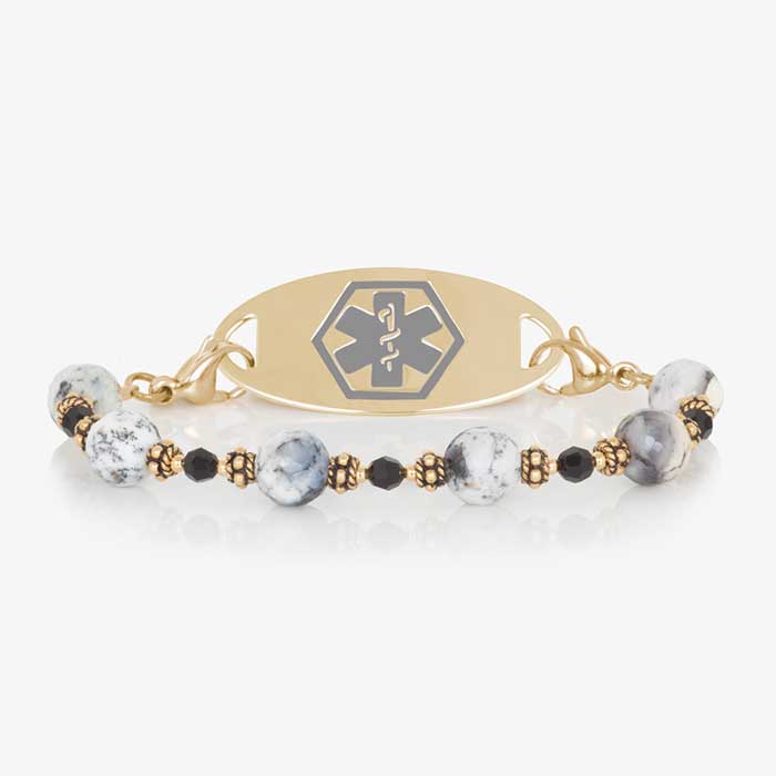 Dendritic opal, black crystal, and gold beaded medical ID bracelet paired with gold tone stainless steel medical ID tag with grey cadu gold tone medical symbol at the center.