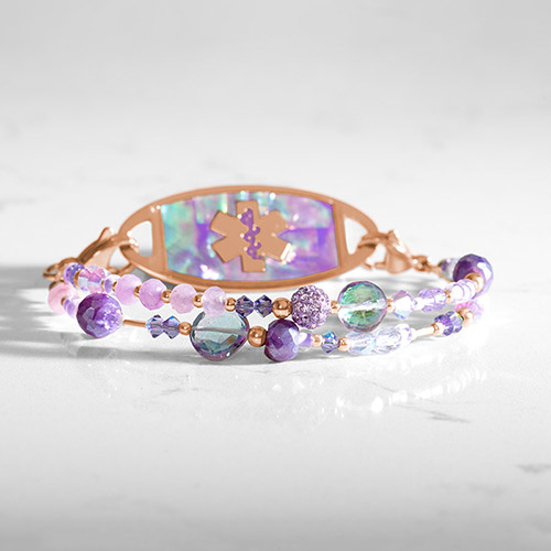 Purple and lavender beaded medical ID bracelet with rose gold accents and lilac abalone medical ID tag