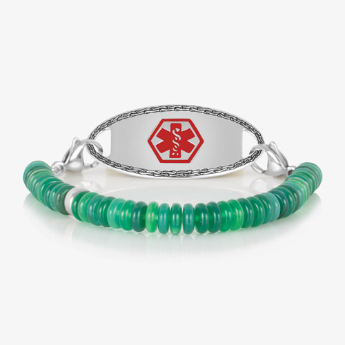 Jade Heishi bracelet with silver lobster clasps, attached to a decorative silver medical ID tag with red caduceus.