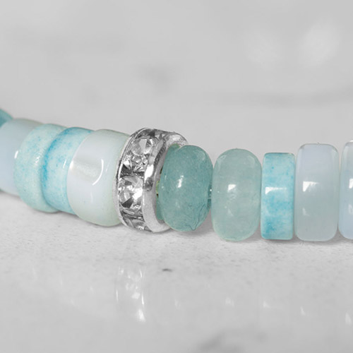 Stylish silver medical ID bracelet laid flat, showcasing intricate craftsmanship, durable chain, and secure clasp.