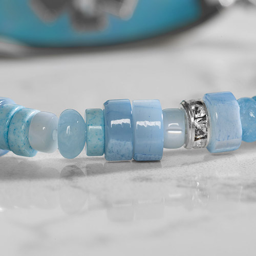 Stylish silver medical ID bracelet laid flat, showcasing intricate craftsmanship, durable chain, and secure clasp.