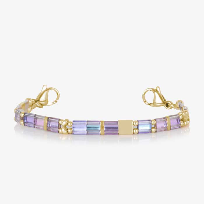 Gold medical ID bracelet with pastel iridescent beads and engraved medical alert tag, designed for interchangeable wear.