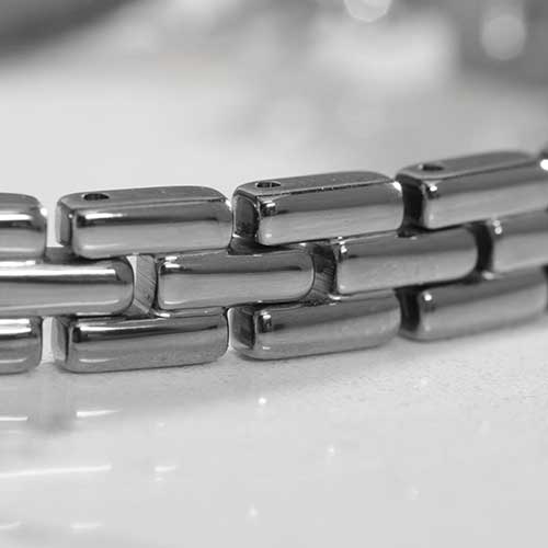 Close up of Silver tone, stainless steel Gate Link Chain bracelet.