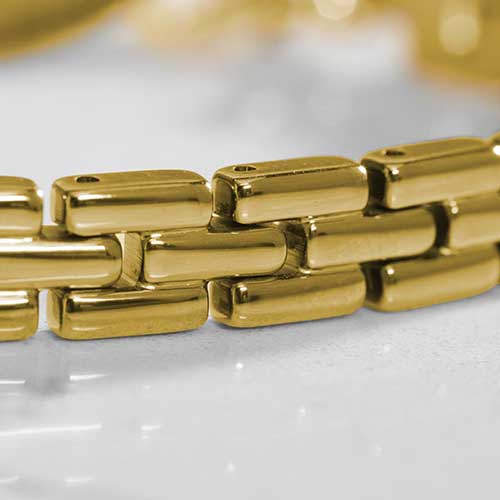 Close up of Gold tone, stainless steel Gate Link Chain bracelet.