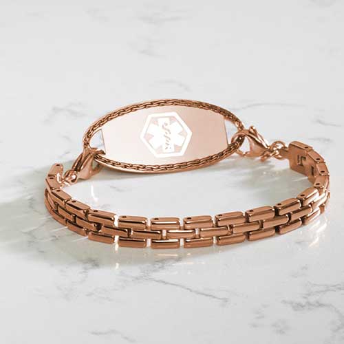 Rose gold tone, stainless steel Gate Link Chain bracelet attached to a decorative, rose gold tone, stainless steel medical ID tag with white medical alert symbol.