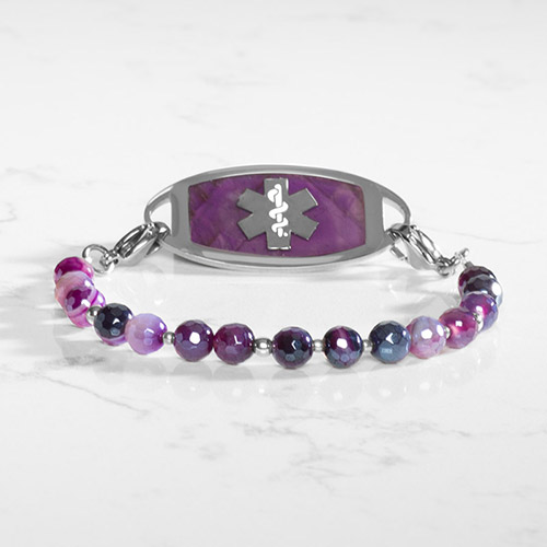 Medical ID bracelet featuring faceted purple agate and silver filled beads, attached to a silver tone medical ID tag with inlaid amethyst.