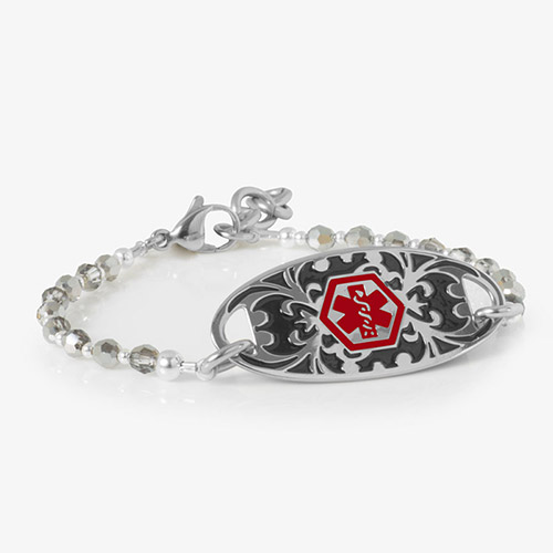 Silver-tone beaded SmartStretch medical ID bracelet with a decorative scroll design tag and red medical emblem.