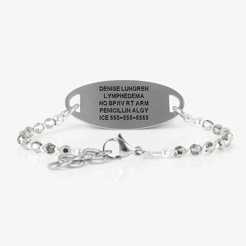 Back view of engraved medical ID tag attached to the Lori SmartStretch bracelet with metallic and crystal-style beads.