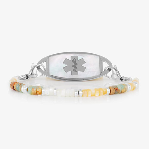 Willow beaded medical ID bracelet with soft-toned gemstone beads and a stainless steel tag featuring a white mother-of-pearl inlay and engraved medical symbol.