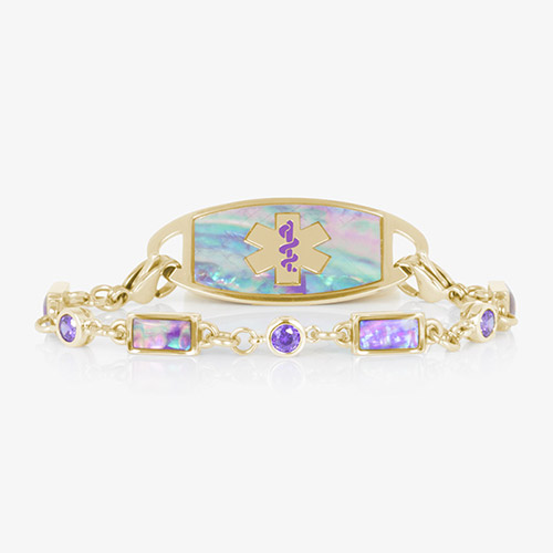 Gold medical alert bracelet with iridescent lilac abalone inlay and purple amethyst accent stones, featuring a purple medical ID symbol on the faceplate.
