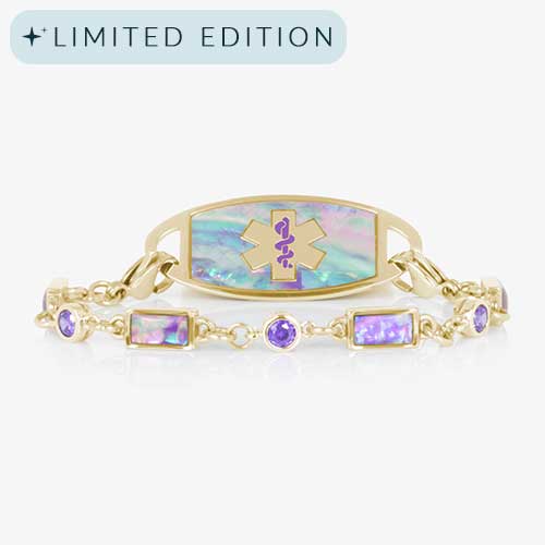 Gold medical alert bracelet with iridescent lilac abalone inlay and purple amethyst accent stones, featuring a purple medical ID symbol on the faceplate.