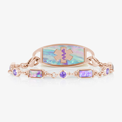 Rose gold medical ID bracelet featuring alternating lilac abalone inlays and violet crystals, paired with matching abalone inlaid ID tag.