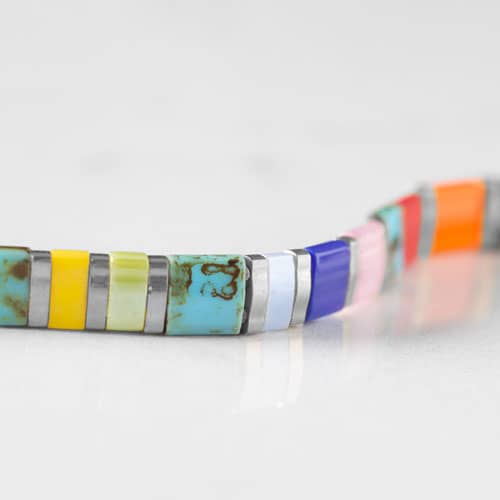 Stretch medical ID bracelet with red, orange, pink, and green tila beads