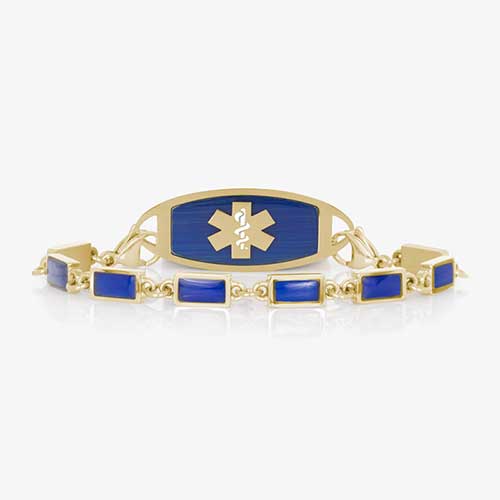 Gold medical ID bracelet with rectangular lapis blue inlays and a matching gold ID tag featuring a blue background and gold medical symbol.