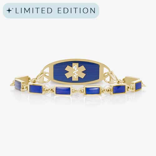 Gold medical ID bracelet with rectangular lapis blue inlays and a matching gold ID tag featuring a blue background and gold medical symbol.