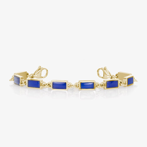 Gold bracelet strand featuring rectangular lapis blue inlays set in gold bezels, designed to pair with an interchangeable medical ID tag.