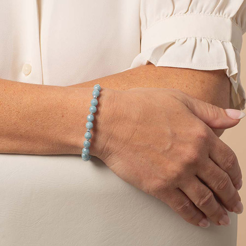 Soft blue and silver beaded medical ID bracelet from Lauren’s Hope shown on model wrist without tag, demonstrating its lightweight, elegant fit.