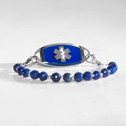 Faceted denim lapis beaded medical alert bracelet with silver accent beads, paired with a silver-tone medical ID tag featuring a cobalt blue face and silver medical symbol.