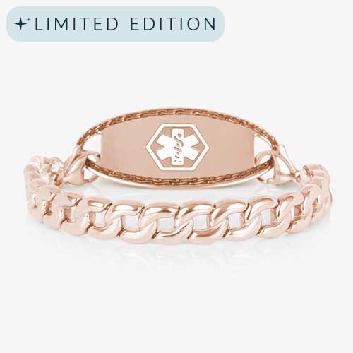 Women&#39;s rose gold medical alert bracelet featuring a bold curb chain and blank medical ID tag with a subtle hexagon overlay showcasing the caduceus symbol.